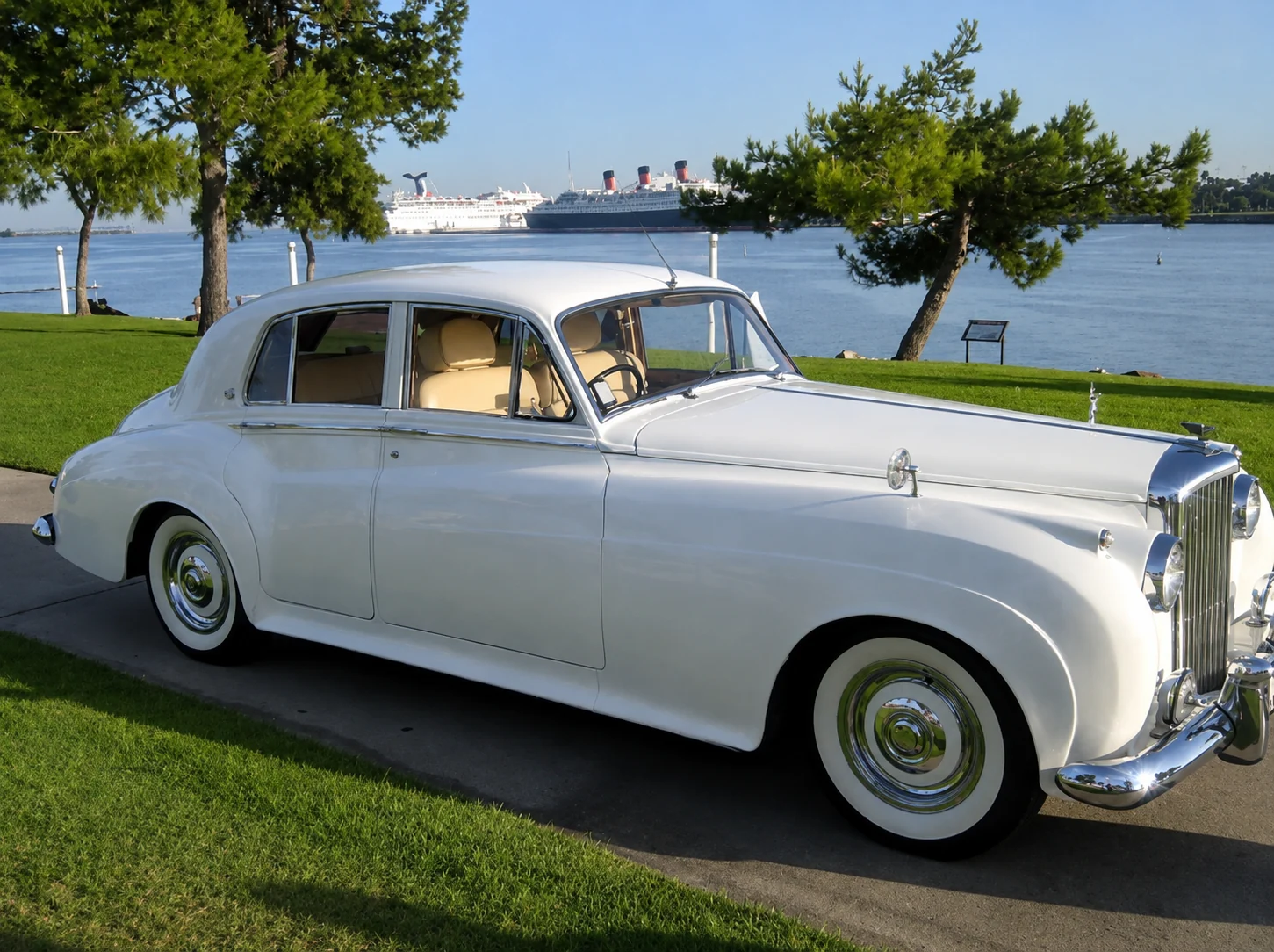 1956 white Bentley beside a Southern California harbor