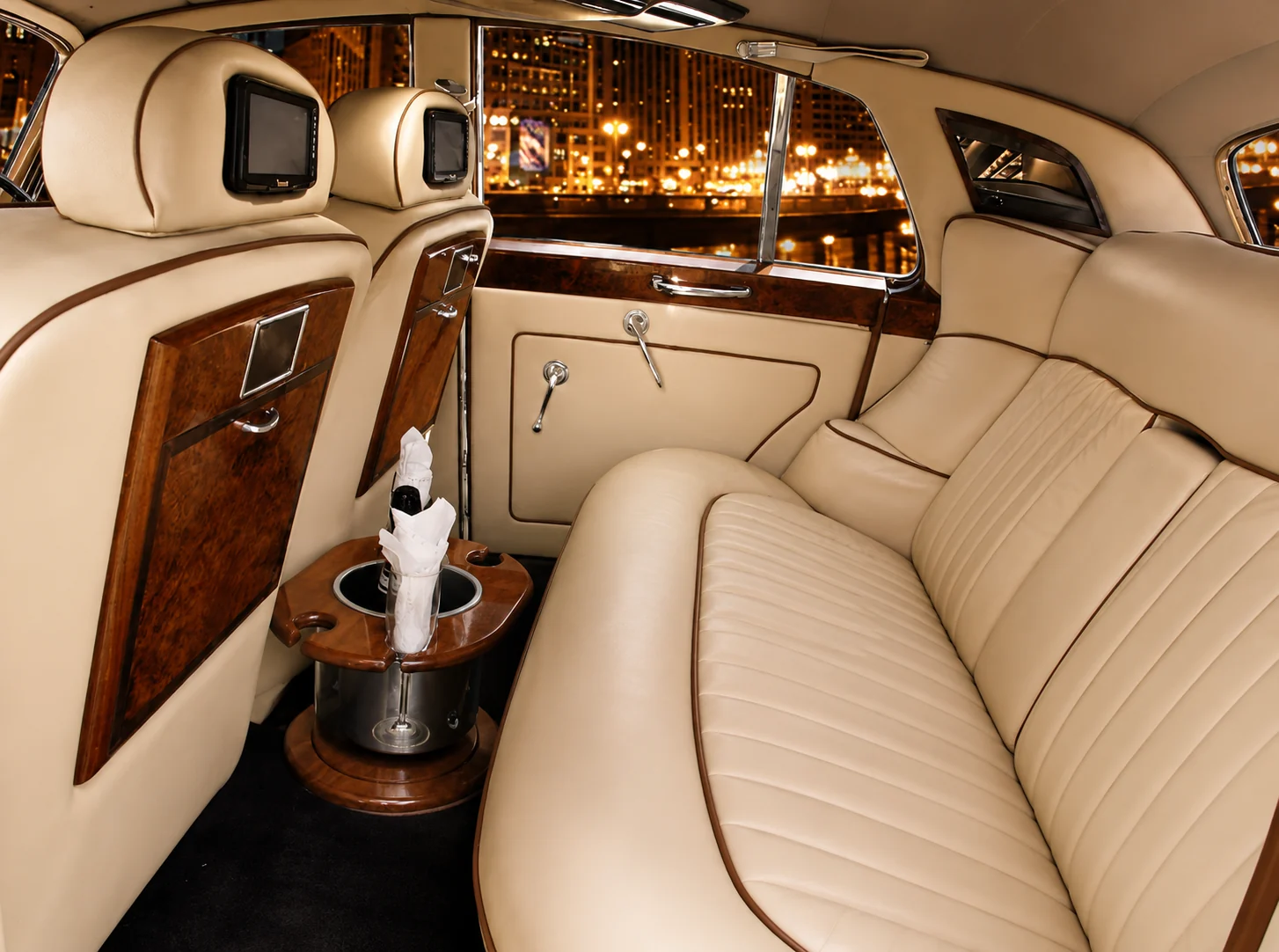1956 Bentley Palomino leather interior with champagne service at night